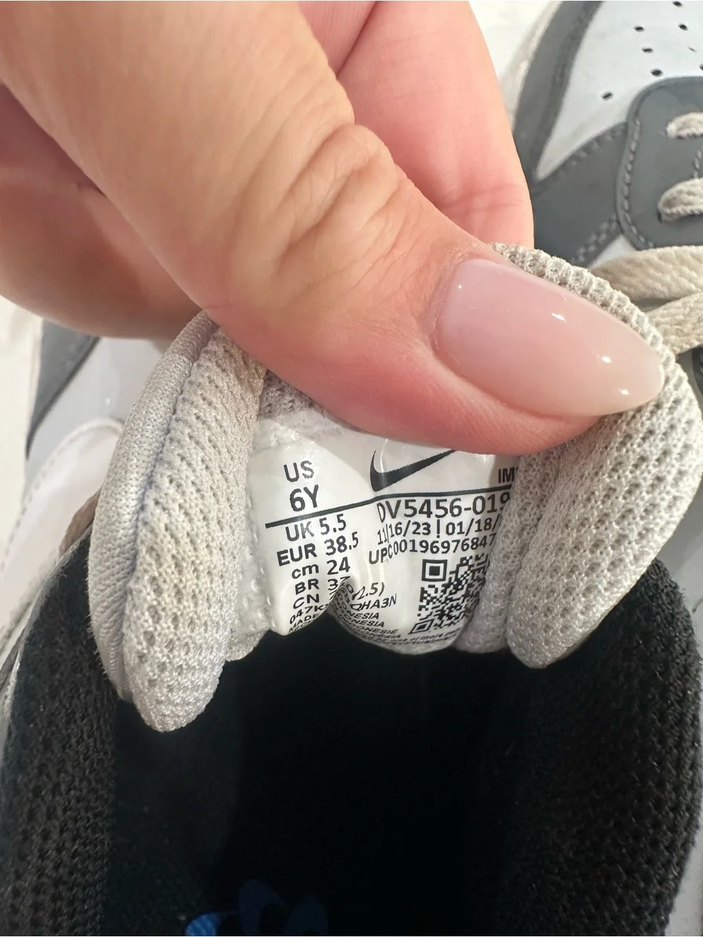 Gray and White Low-Top Nike Boys Sneakers